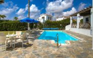 Luxurious pool area at Elektra Villa in Kissonerga Paphos, perfect for relaxation.