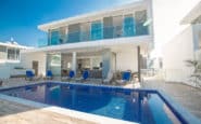 Luxurious modern villa with pool, balcony, and sleek design in Protaras.