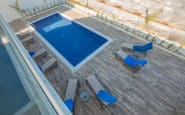 Luxurious outdoor pool area with modern design and inviting atmosphere in holiday rentals cyprus protaras