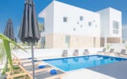 Cyprus Villa Rentals with Luxurious modern villa with pristine pool area, perfect for relaxation and leisure.