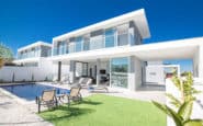 Luxurious modern villa with pool and outdoor living space in Protaras, Cyprus.