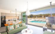 Modern Cyprus Protaras Villa Rental with  open-plan living space with pool view at Villa Belle in Cyprus.