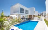 Luxurious modern villa with pool and outdoor dining area in Cyprus Protaras Villa Rentals.