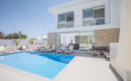 Luxury villa with pool, modern design, relaxation space, perfect for holiday access Cyprus Protaras Villa Rentals.