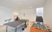 Modern recreational room with table tennis and foosball setup in Cyprus Ayia Napa Villas