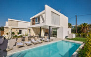 Ayia Napa Villas with pool, patio, and outdoor dining area in upscale neighbourhood in Ayia Napa.