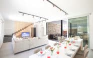 Modern and chic living and dining area with outdoor access in Ayia Napa Villa