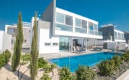 Luxurious modern two-story house with pool in upscale residential development in Protaras.