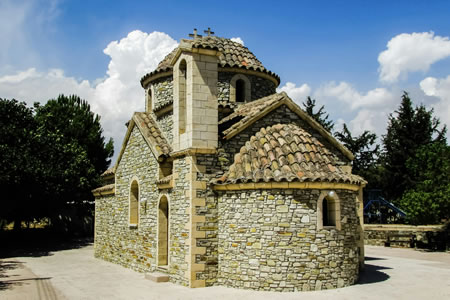 Traditional stone chapel in a lush green setting, history-Polis-Chrysochous.